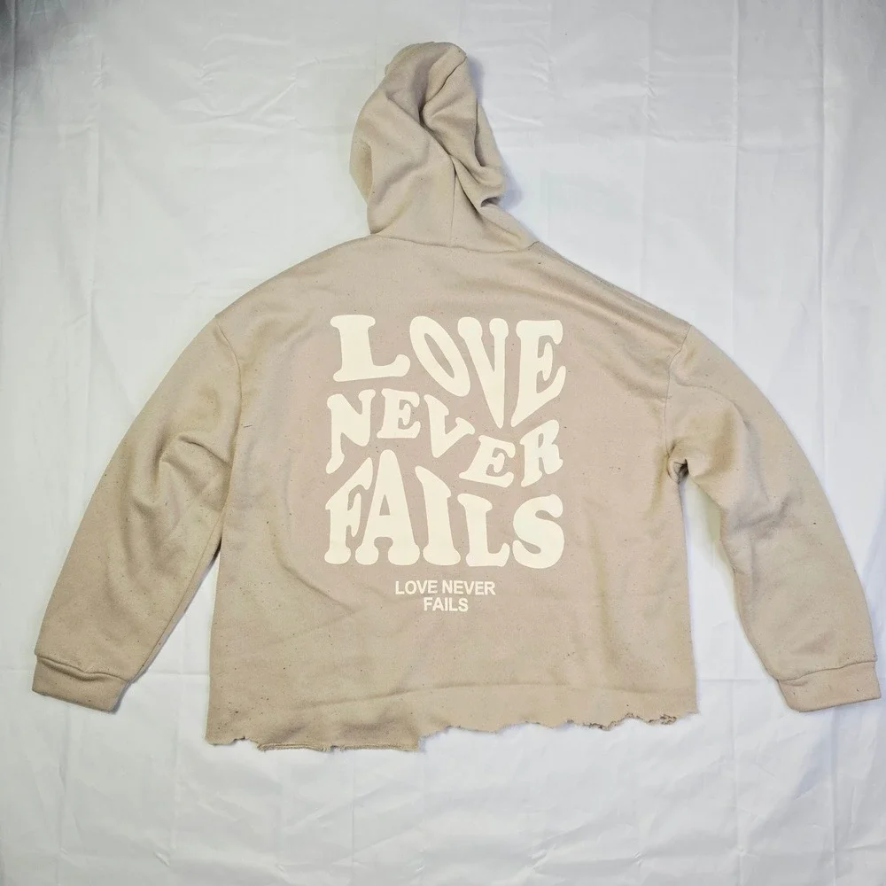 Men's Love Never Fails Fleece Hoodie Size M Beige Distressed Raw Hem T3